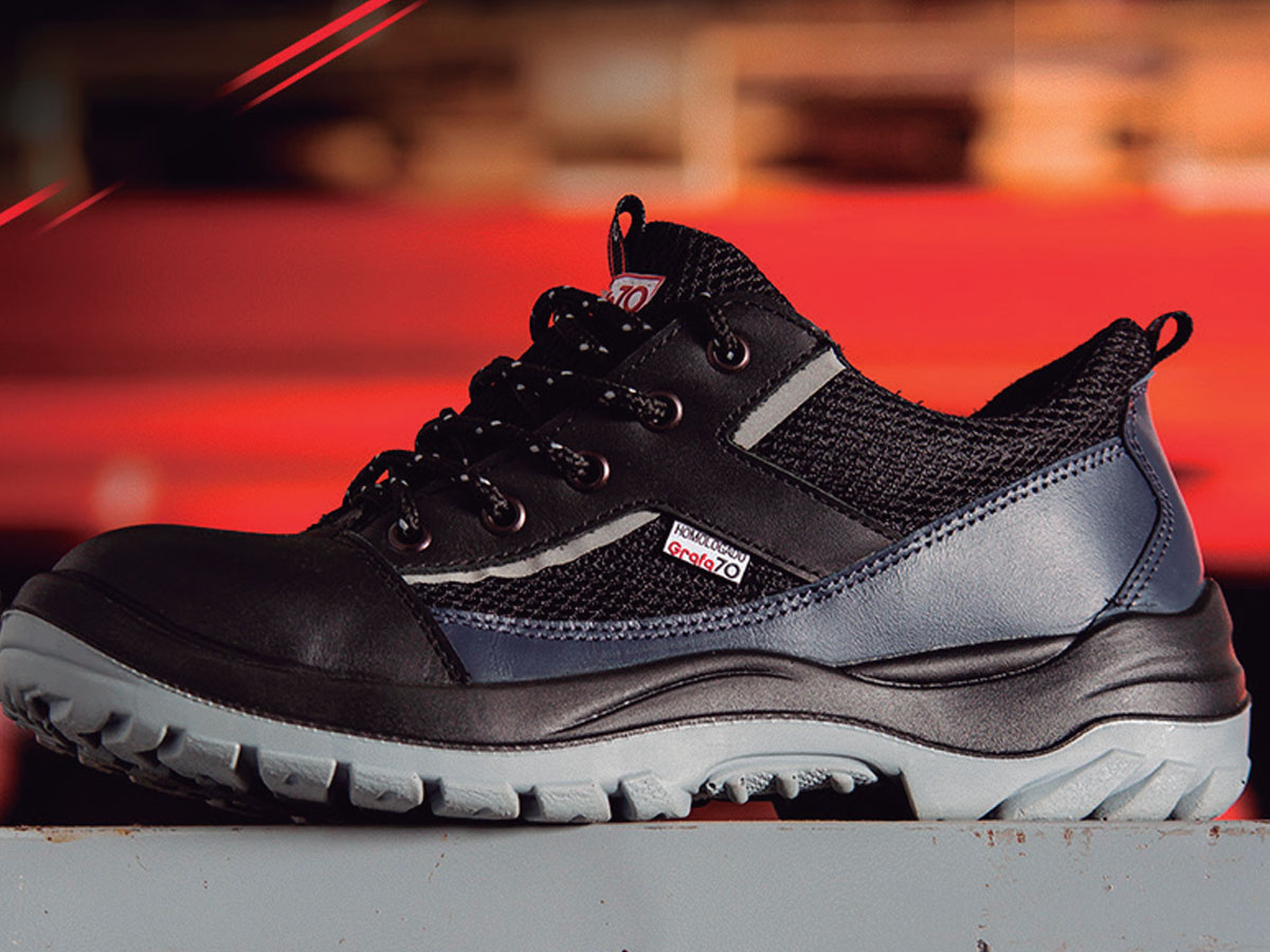 Work safety protection equipment. flat lay on wooden background.